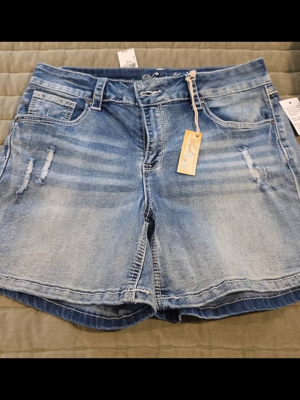 Women’s Light Wash Distressed Denim Shorts